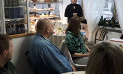 Uczestnicy słuchają wypowiedzi prelegenta